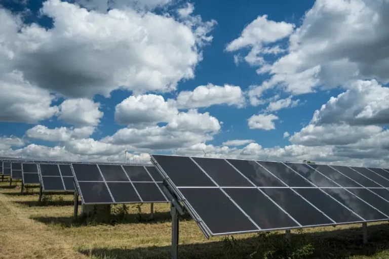 solar-panels-used-renewable-energy-field-sky-full-clouds